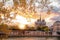 Notre Dame cathedral against colorful sunset during spring time in Paris, France