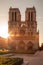 Notre Dame cathedral against sunrise in Paris, France