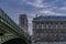 Notre-Dame Cathedral Hidden Behind Historic Bridge Parisians Buildings Clouds Paris