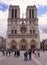 Notre Dame cathedral with many people as tourists, Paris.