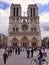 Notre Dame cathedral with many people as tourists, Paris.