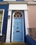Notting hill, London, colorful entrance with light blue arched door