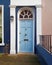 Notting hill, London, entrance with light blue arched door