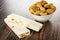 Nougat with peanut, groundnut in bowl on wooden table