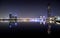 Nov 5 2020. Beautiful night view of the illuminated business bay bridge across the water with reflections surrounded by the