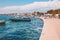 Novalja, Pag Island, Croatia - July 22 2018: Picturesque promenade of Novalja town. The place is popular with young tourists in