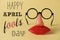 Novelty glasses and text happy april fools day