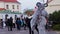 November 2, 2019 Minsk Belarus Children say goodbye to a man in the costume of a beast