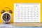 The November 2022 Monthly desk calendar for 2022 year and alarm clock