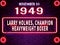 November 3, 1949 - Larry Holmes, champion heavyweight boxer , brithday noen text effect on bricks background