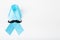 November Prostate Cancer Awareness month. Blue Ribbon on white background. Healthcare, International men, Father and World cancer