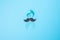 November Prostate Cancer Awareness month, light Blue Ribbon with mustache for supporting people living and illness. Healthcare,