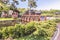 Novi Petrivtsi, Ukraine - May 15, 2018: Fragment of buildings in Mezhyhiria near Kiev. A small bridge across the lake.