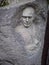Novodevichy cemetery in Moscow, grave, sculpture, face in stone, fine art