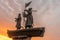 Novokuznetsk, Kemerovo region, Russia. May 15, 2023. Statue of pioneers of Siberia at sunset