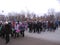 Novosibirsk day holiday Joyful crowd of people walking along the road watching the event