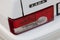 Novosibirsk, Russia - 05.20.2020: A close-up of the taillight of a white Russian LADA car of red color with a brake light and a