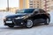 Novosibirsk, Russia - 12.01.2018: Black Lexus ES250 2014 release with an engine of 2.5 liters front view on the car parking with