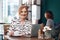 Now for another coffee. Portrait of an attractive middle aged woman having a cup of coffee inside of a coffee shop