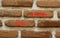 Now hiring symbol. Concept words Now hiring on beautiful brown bricks. Beautiful brick wall background. Beautiful brick wall.