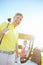 Now this is retirement. Low angle shot of a handsome older golfer standing in front of a golf cart with his golfing