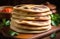 Nowruz, traditional Iranian and Turkic cuisine, stack of national Uzbek tortillas, traditional pastries