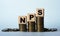 NPS - acronym on wooden cubes. Which stand on stacks of coins on a light background