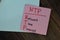 NTP - Network Time Protocol write on sticky notes isolated on Wooden Table