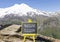 Nuclear fission symbol. Concept words Nuclear fission on beautiful black chalk blackboard. Chalkboard. Beautiful mountain Elbrus