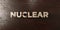 Nuclear - grungy wooden headline on Maple - 3D rendered royalty free stock image