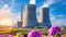 Nuclear power plant and scenic landscape with lush green fields and beautiful horizon view