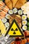 a nuclear radiation warning sign above blurred sushi vertical composition