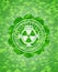 Nuclear, radioactive icon inside green emblem. Mosaic background