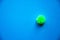 Nucleus, Coronavirus molecule. Flu virus of green and red color on a blue background. Flu vaccine, coronavirus. Copy Space. Covid-