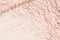 Nude facial powder texture as cosmetics background