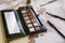 Nude palette of shadows and brush. Fashion, beauty concept. Professional makeup decorative cosmetics. Flat lay, top view