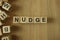 Nudge word from wooden blocks