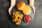 Nuggets, two cheeseburgers and chili sauce on slate board