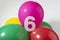 Number 6 and colourful round balloons. Birthday, anniversary, jubilee concept.