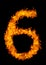 Number 6 font in burning fire isolated on dark background for numeric design purpose