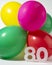 Number 80 and colourful round balloons. Birthday, anniversary, jubilee concept.