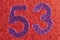 Number fifty-three purple color over a red background. Anniversary