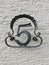 Number five made of wrought iron on a house facade