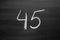 number forty five enumeration written with a chalk