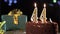 Number forty-four birthday candle on a sweet cake on the table, 44th birthday. Fire from the lighter, blow out the