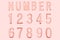 Number letter retro vintage style in Rose Gold color