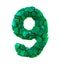 Number nine 9 made of broken plastic green color isolated white background