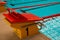 Number one start red platform on blue swimming pool for sport competition