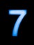 Number seven 7 sign in blue led light on a black background