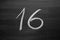 number sixteen enumeration written with a chalk